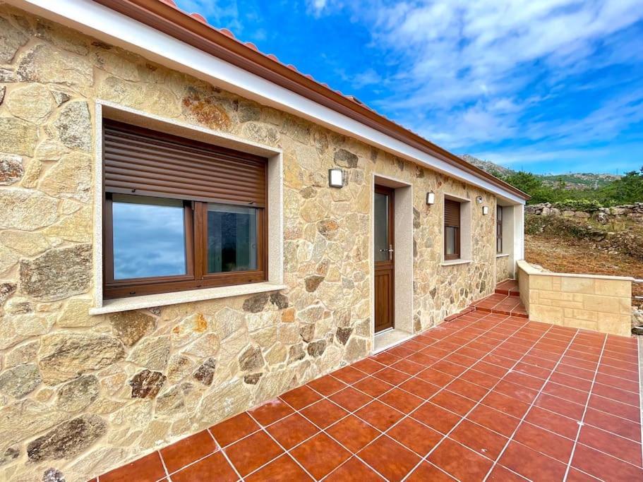 Solpor De Ezaro Villa Dumbría Buitenkant foto